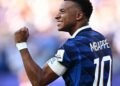 França Supera Retranca Paraguaia com Pênalti de Mbappé e Avança nas Oitavas da Copa
