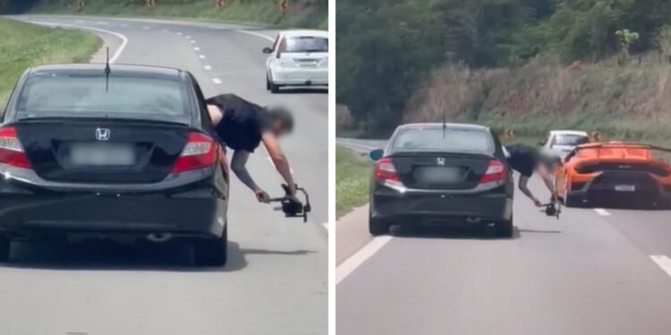 Videomaker se pendura para fora de carro para fazer imagens de Lamborghini na BR-153; vídeo